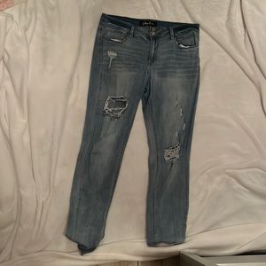 Size 13 Pair of ripped blue jeans